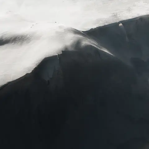 Terrain-based listing media visual showing remote land context and presentation clarity.