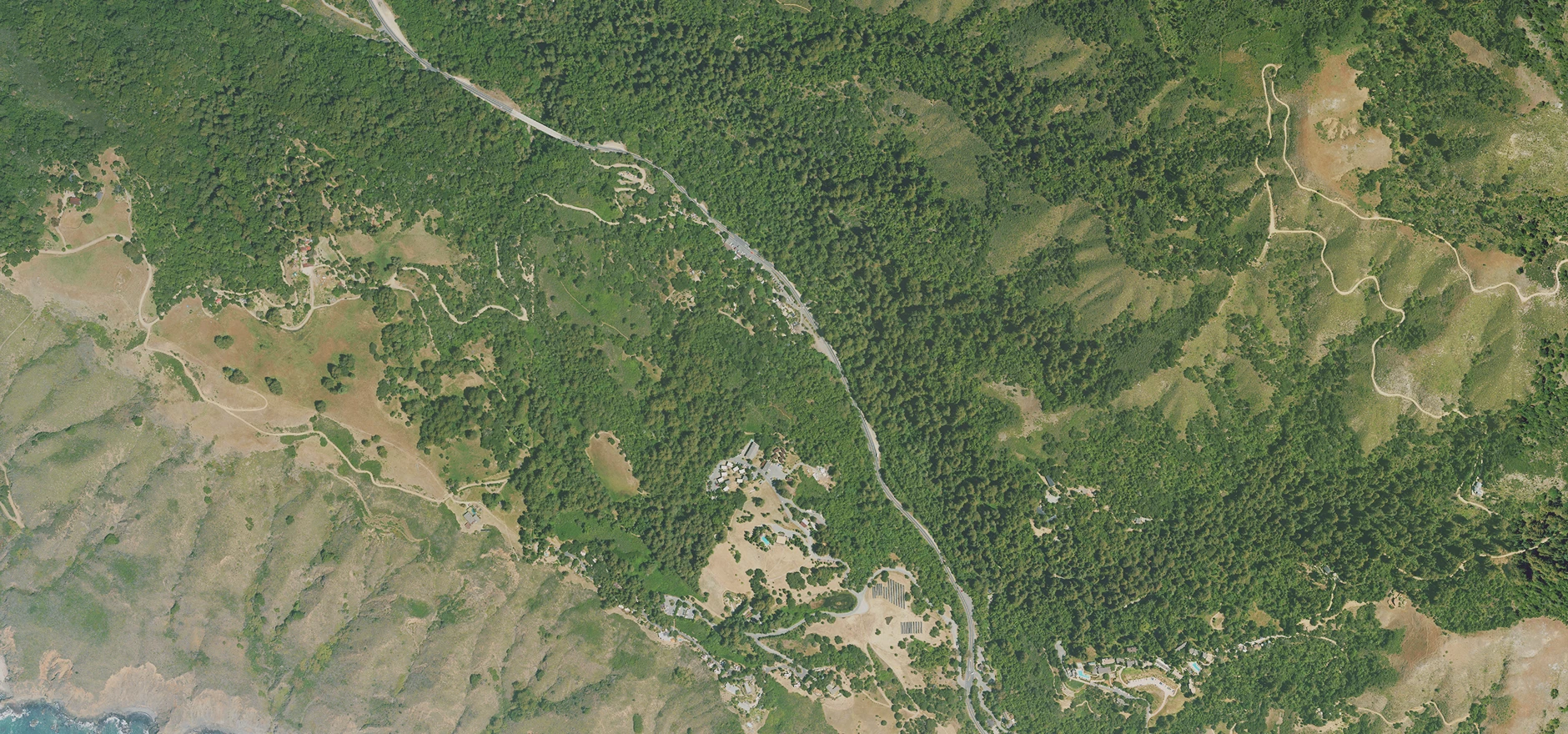 Wide terrain and coastline property context.