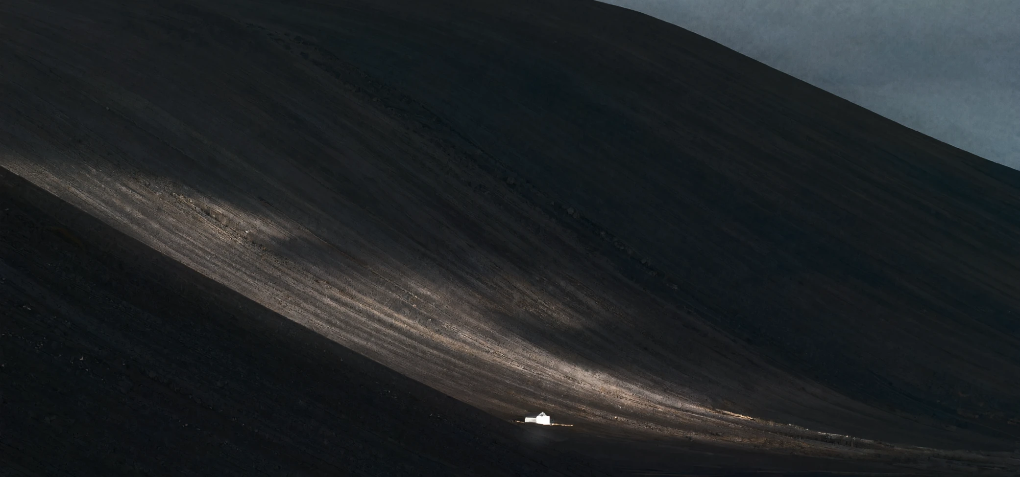 Dark terrain slope visual used for site intelligence.